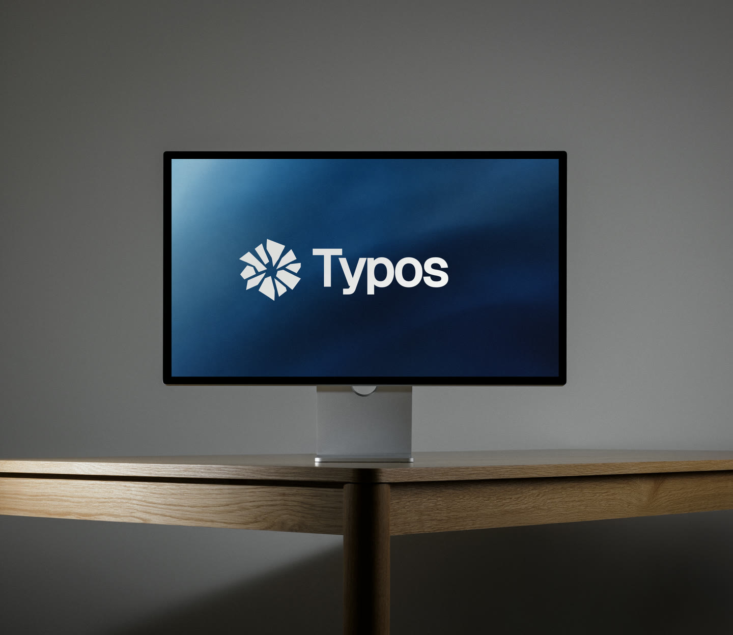 Studio Display mockup featuring the Typos Studio visual identity